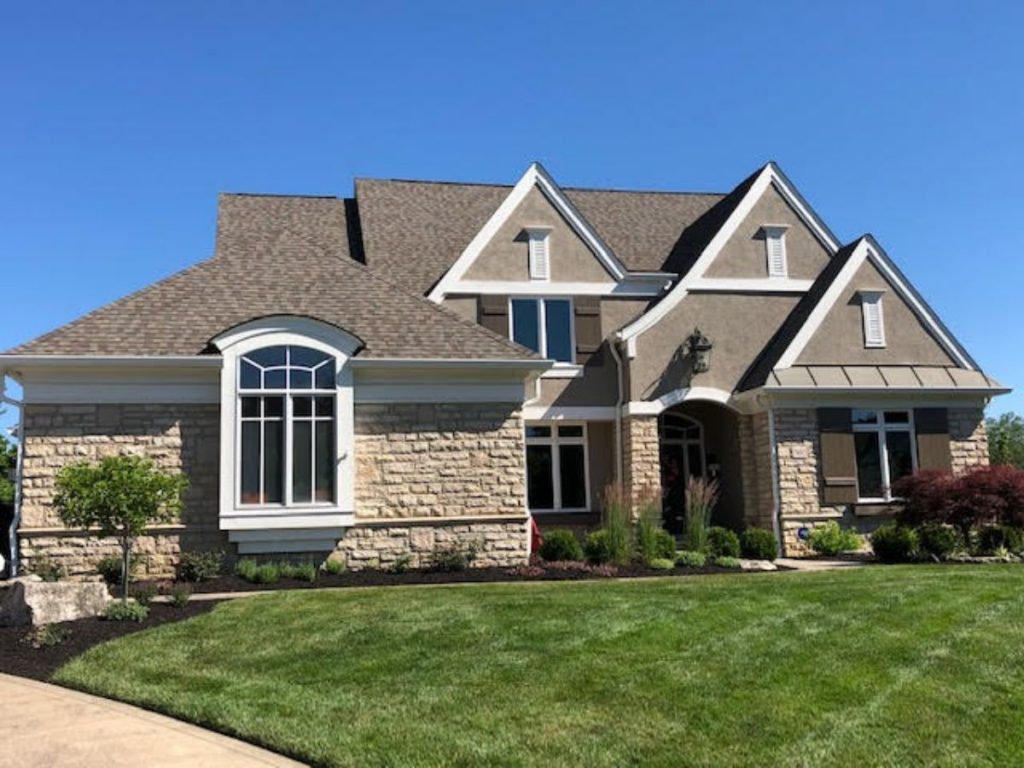 A large suburban custom home with replacement windows