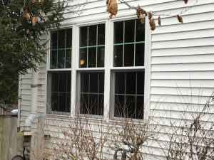 A set of three lovely double-hung windows in a row.