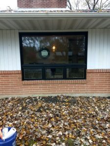 Custom replacement windows installed on a home.