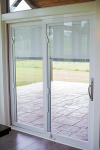 Patio door with internal blinds.